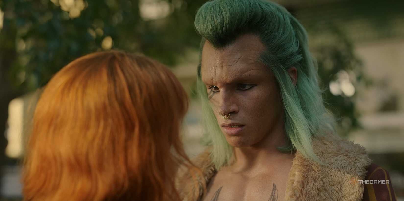 Bartolomeo looks at Nami while he explains how to steal in Netflix's One Piece Season 2.