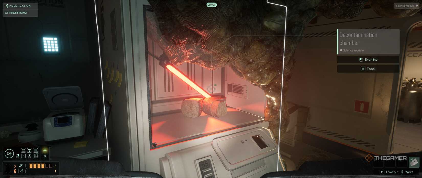 A Decontamination Chamber with some artifact pieces inside it in Cthulhu The Cosmic Abyss.