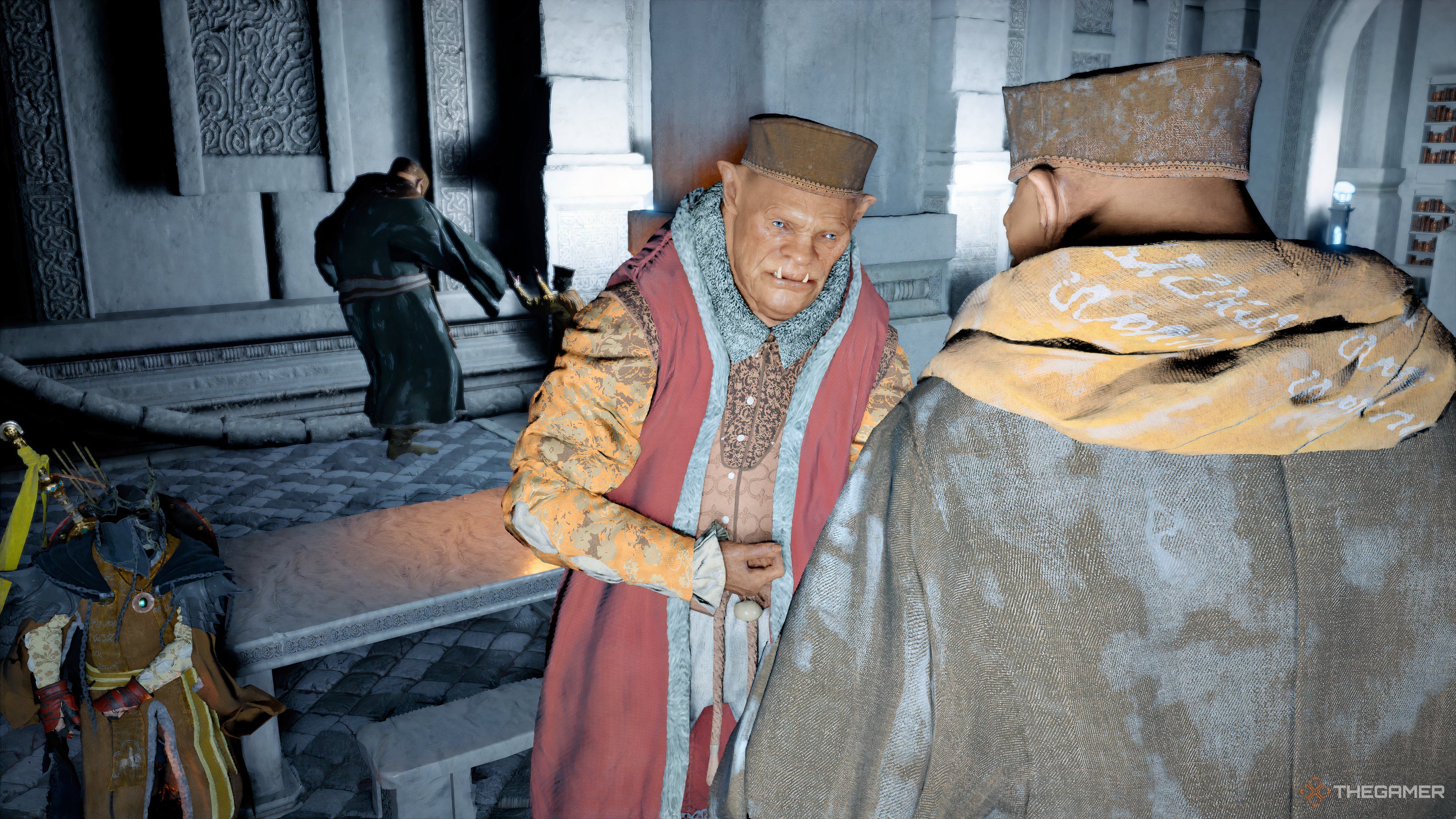 A manager talking with a colleague in the Crimson Desert.