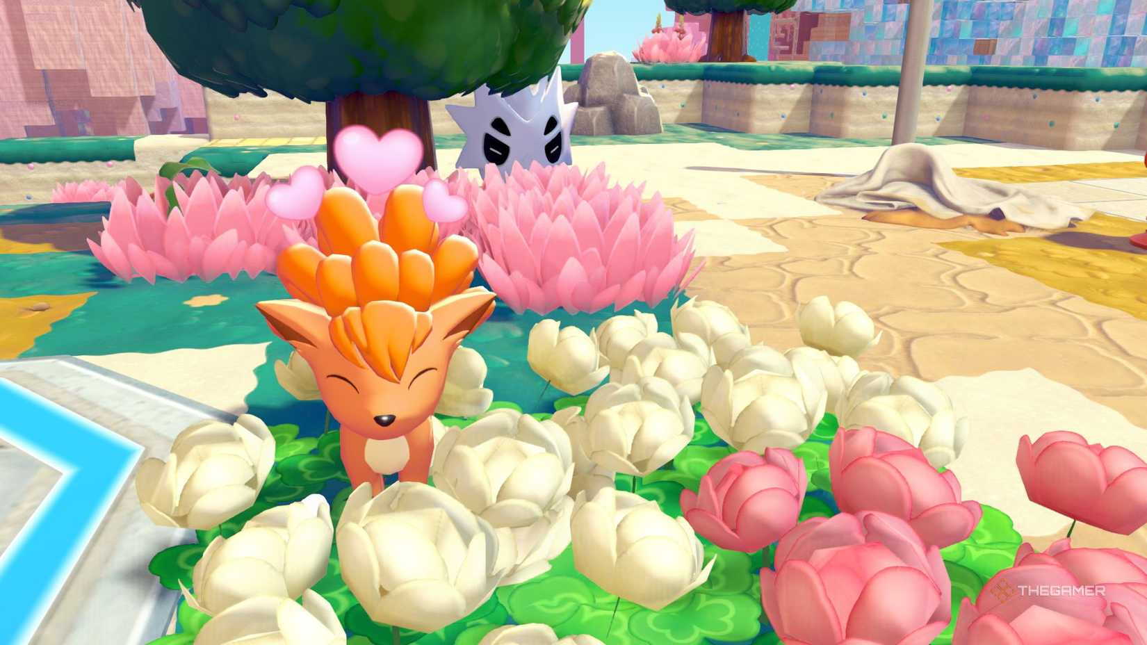 Vulpix in a field of flowers in Pokemon Pokopia.