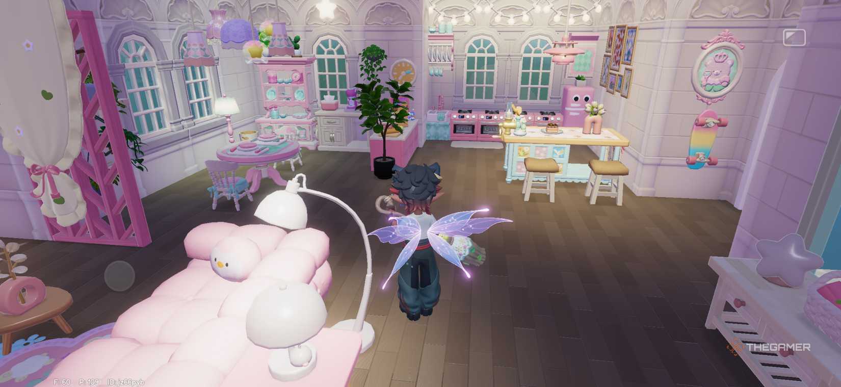 A player is standing in front of a pink themed kitchen in Hartopia.