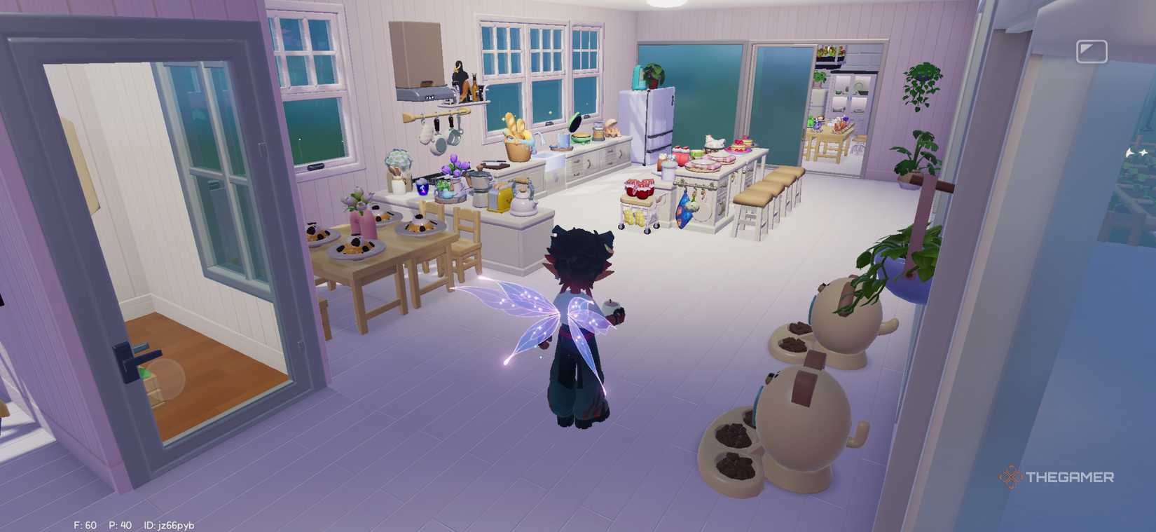 A player is standing in front of a large modern kitchen in Hearttopia.