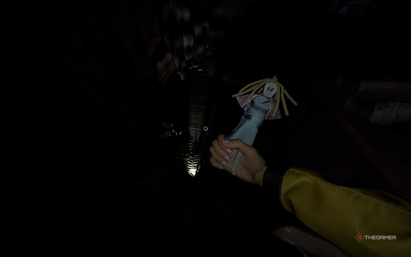 She holds a doll in Phasmophobia.
