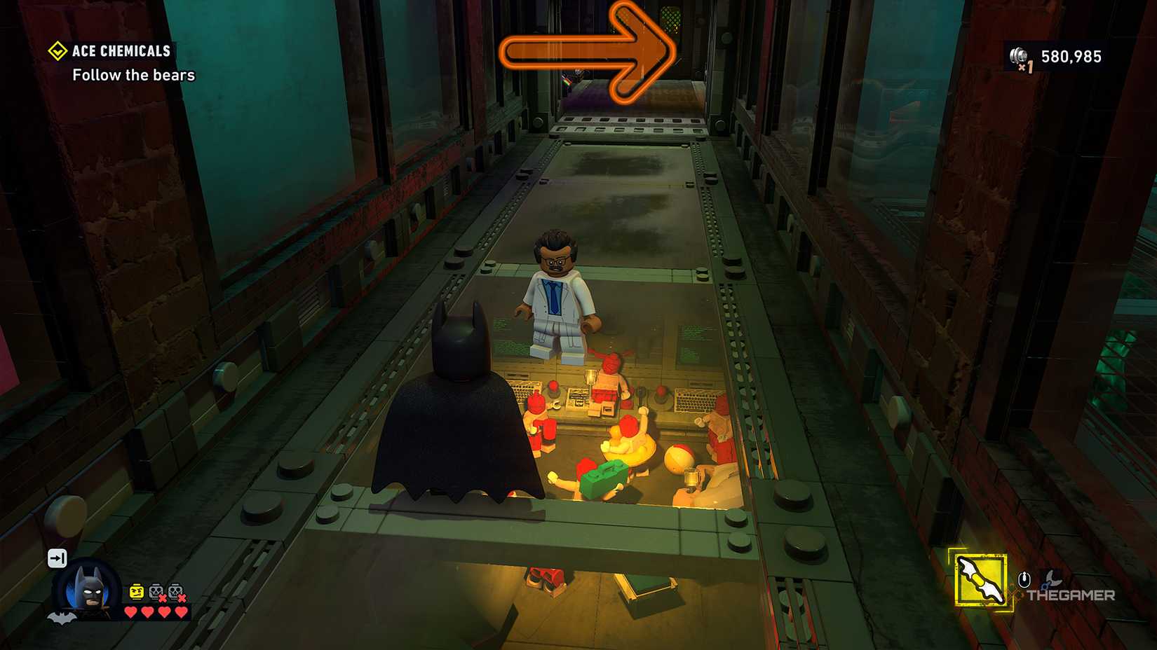 Batman and Jim Gordon standing in the glass walkway above Red Hood's party in LEGO Batman Legacy of the Dark Knight.