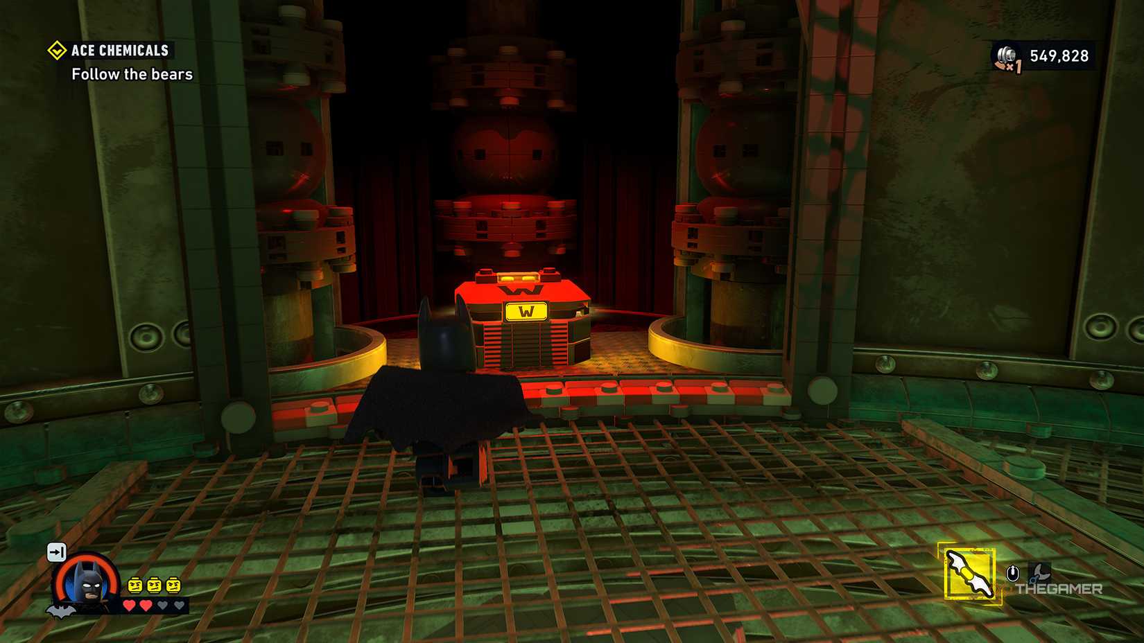 Batman running towards the Waynetech cache in LEGO Batman Legacy of the Dark Knight.
