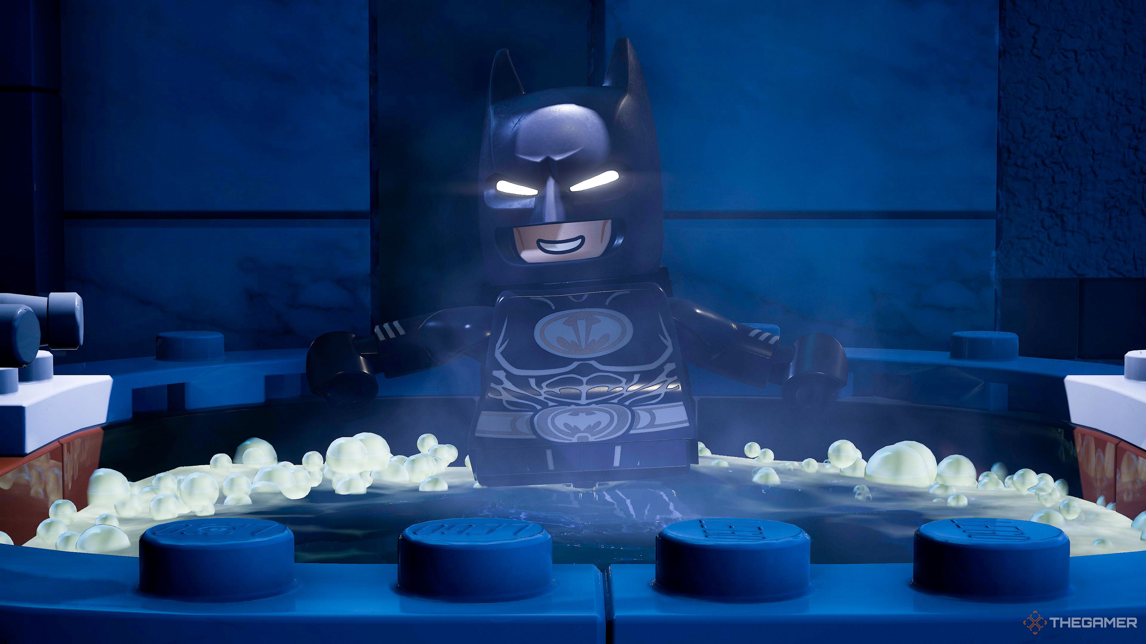 Lego Batman chills in a hot tub in Lego Batman Legacy of the Dark Knight.