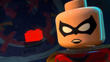 Lego Robin posing in front of a red brick.