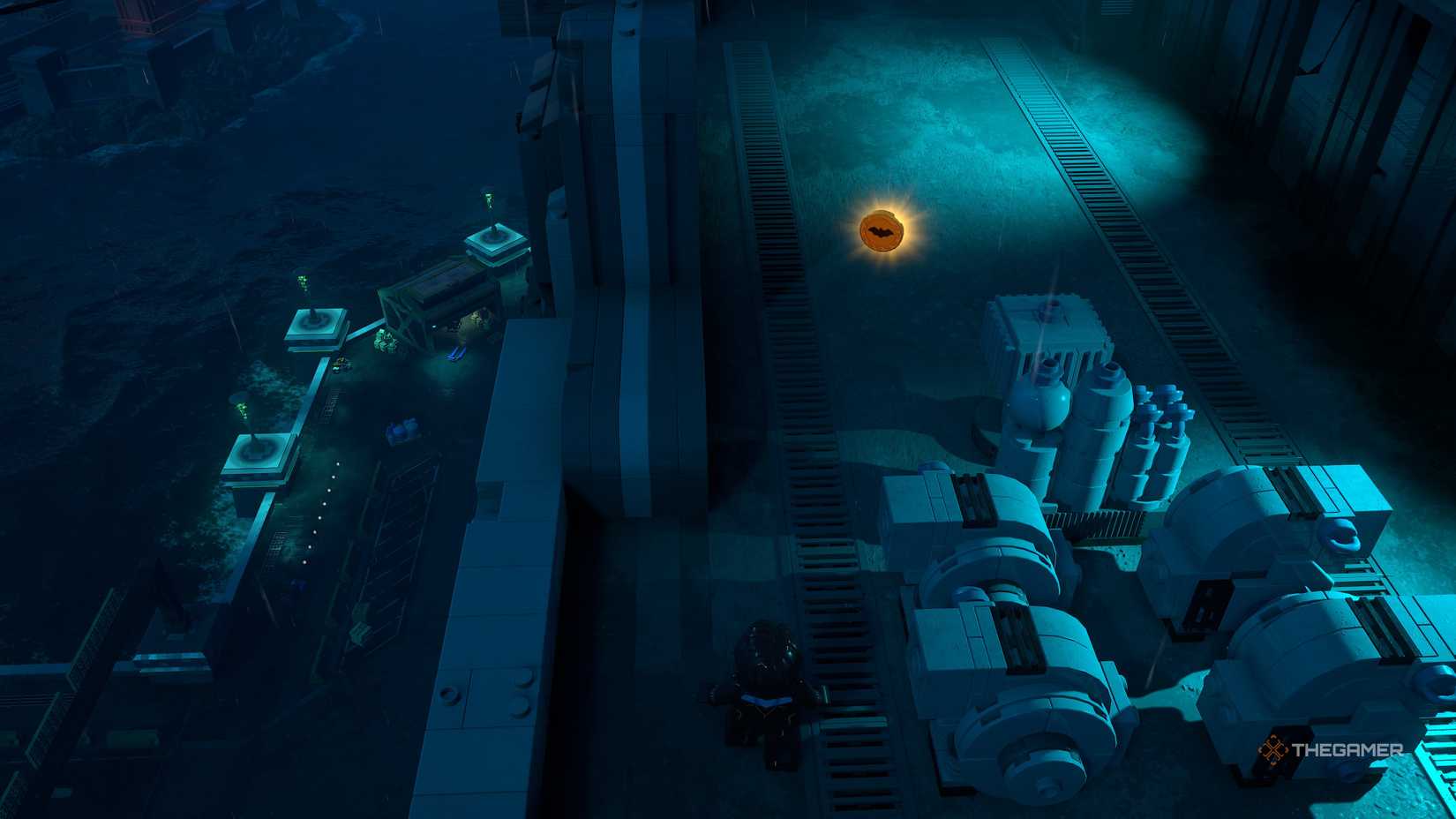 Nightwing looks at the bat symbol on the roof in Lego Batman Legacy of the Dark Knight.