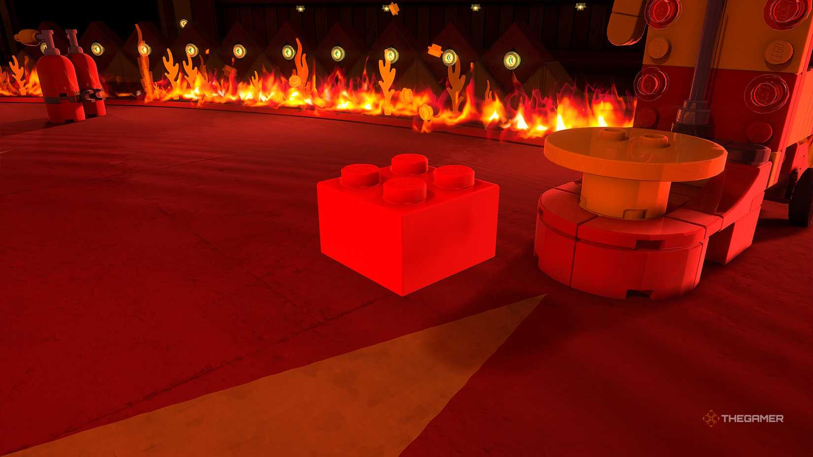 The red brick at the foot of your ball machine test in LEGO Batman Legacy of the Dark Knight.