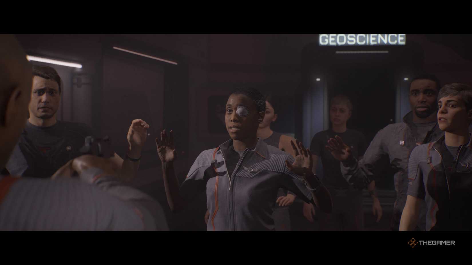 Stafford aiming at the crew in episode six of The Dark Pictures Anthology Directive 8020.