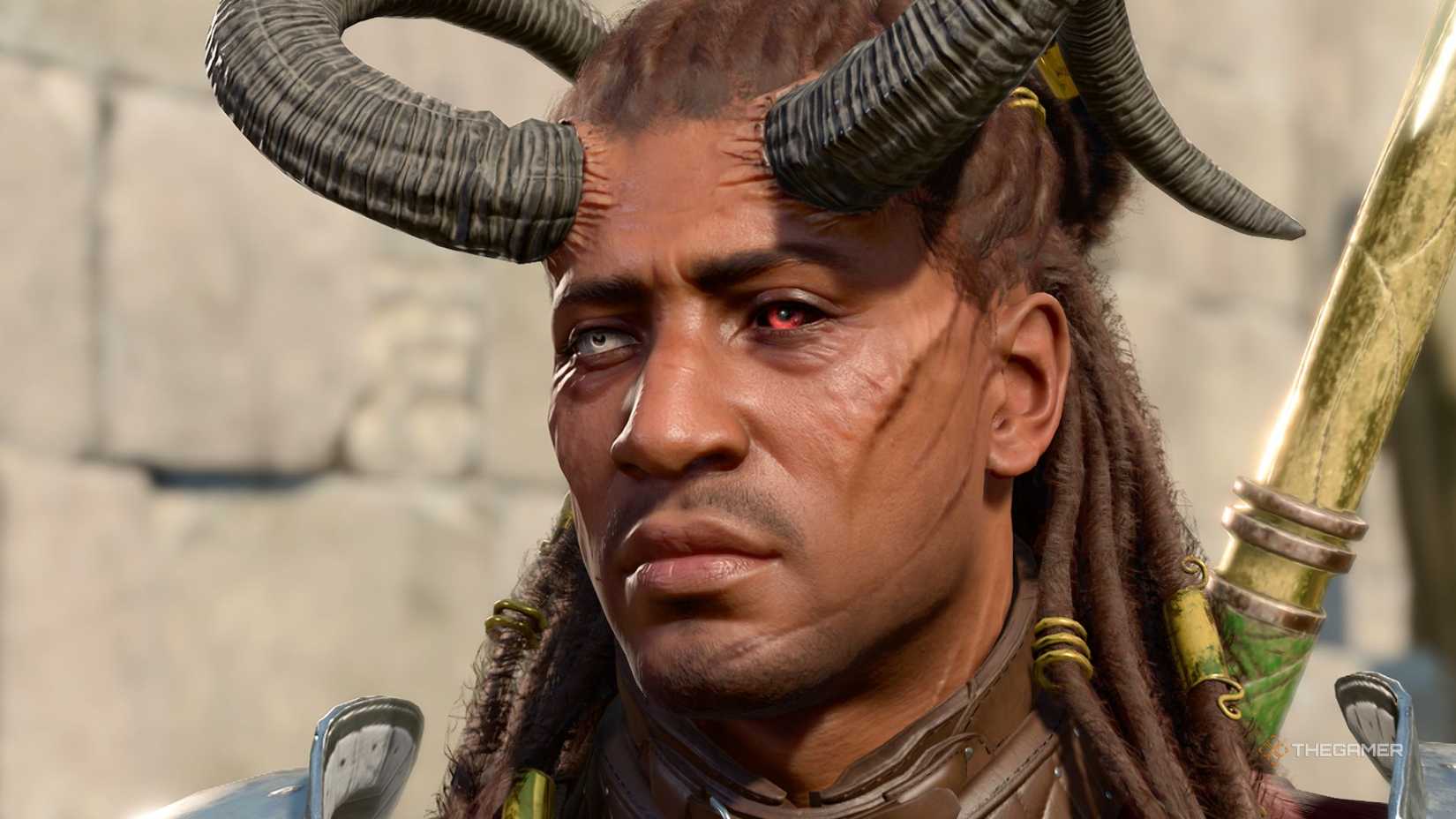 Wyll looks pensive in Baldur's Gate 3. He is a human with one blue, one red and one black eye. It has horns. He wears silver and red armor. (1)