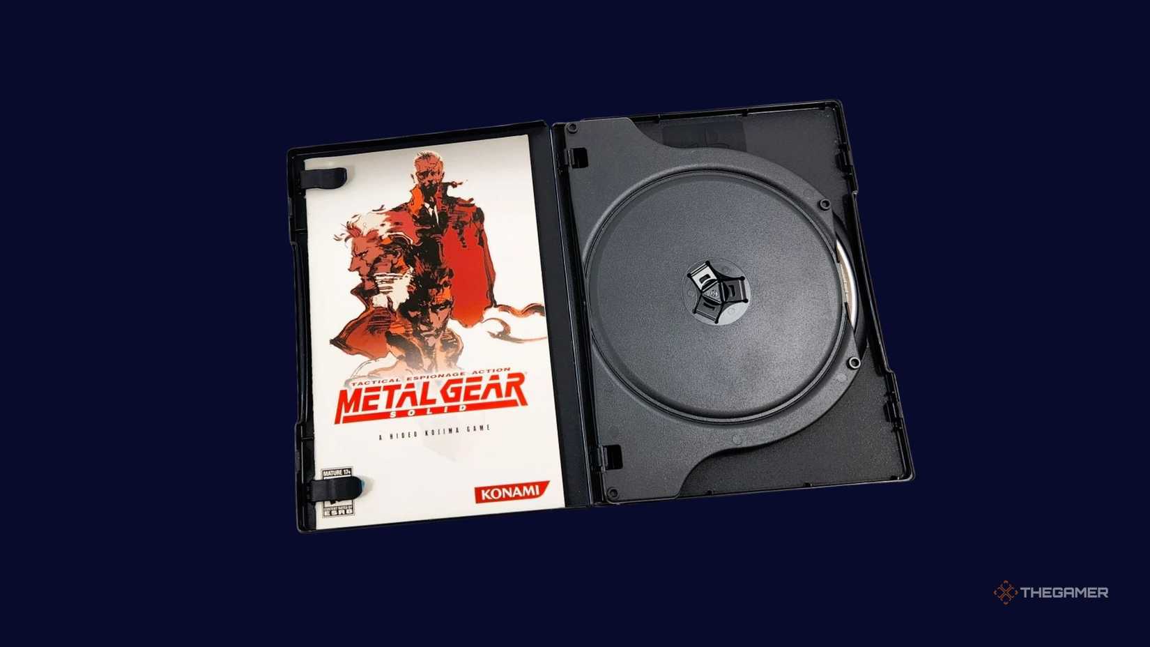 Metal gear wheel in front of a navy background.