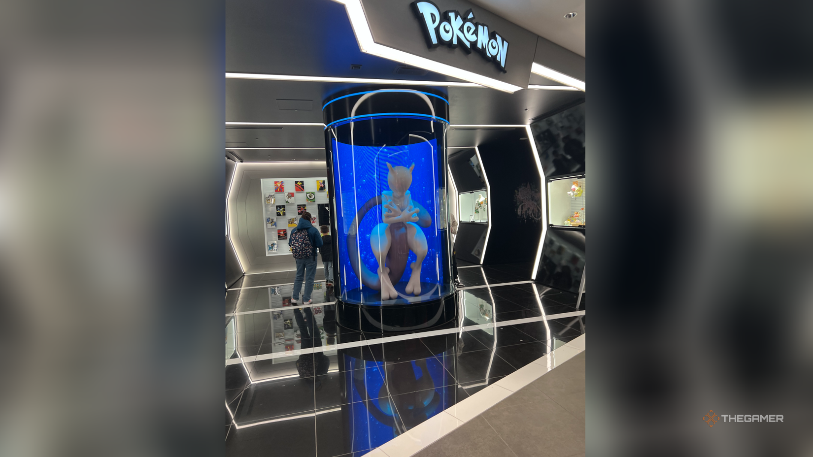 A photograph taken by me of Mewtwo in a pipe at shibuya pokemon center.
