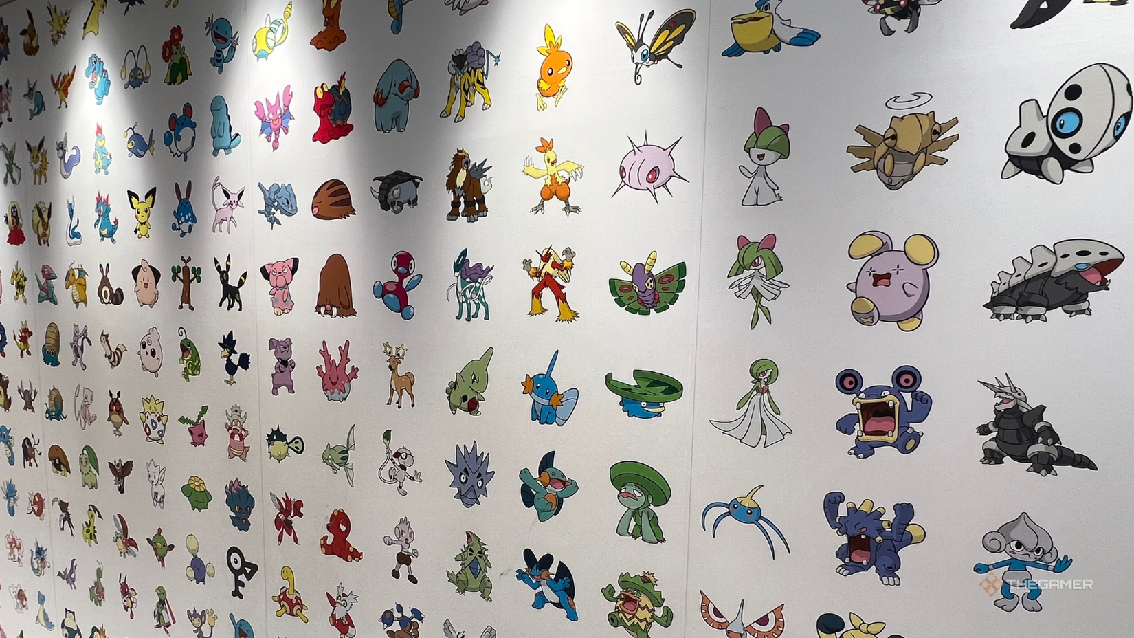 Pokemon graffiti on the wall at the entrance to the MEGA TOKYO Pokemon Center.