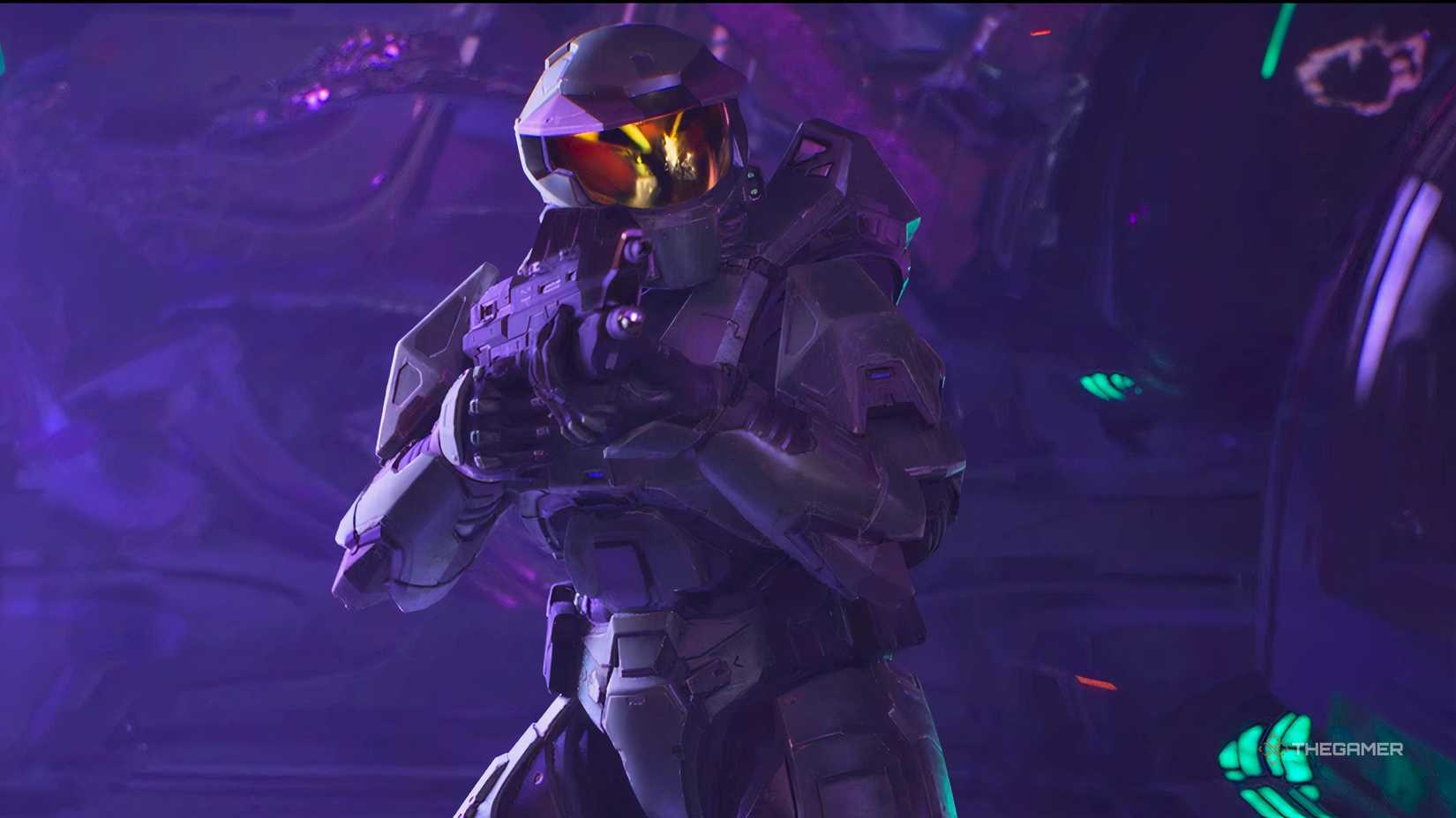 A closeup of Master Chief holding a gun in Halo Campaign Evolved.
