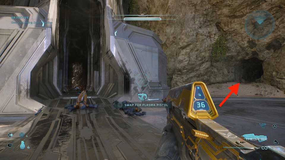 An arrow pointing at a cave in Halo: Campaign Evolved.