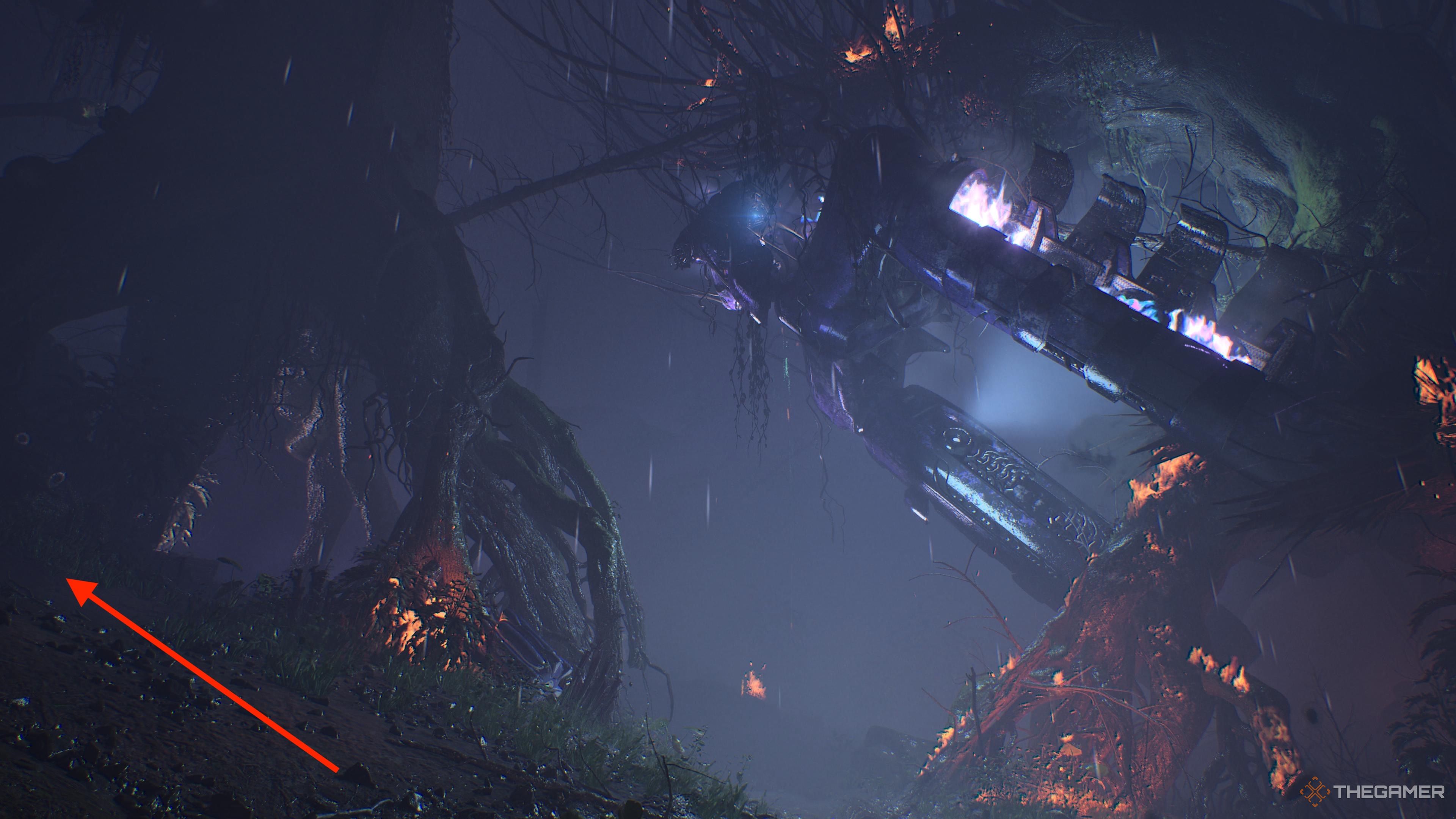 A crashed ship in a dark forest in Halo Campaign Evolved.