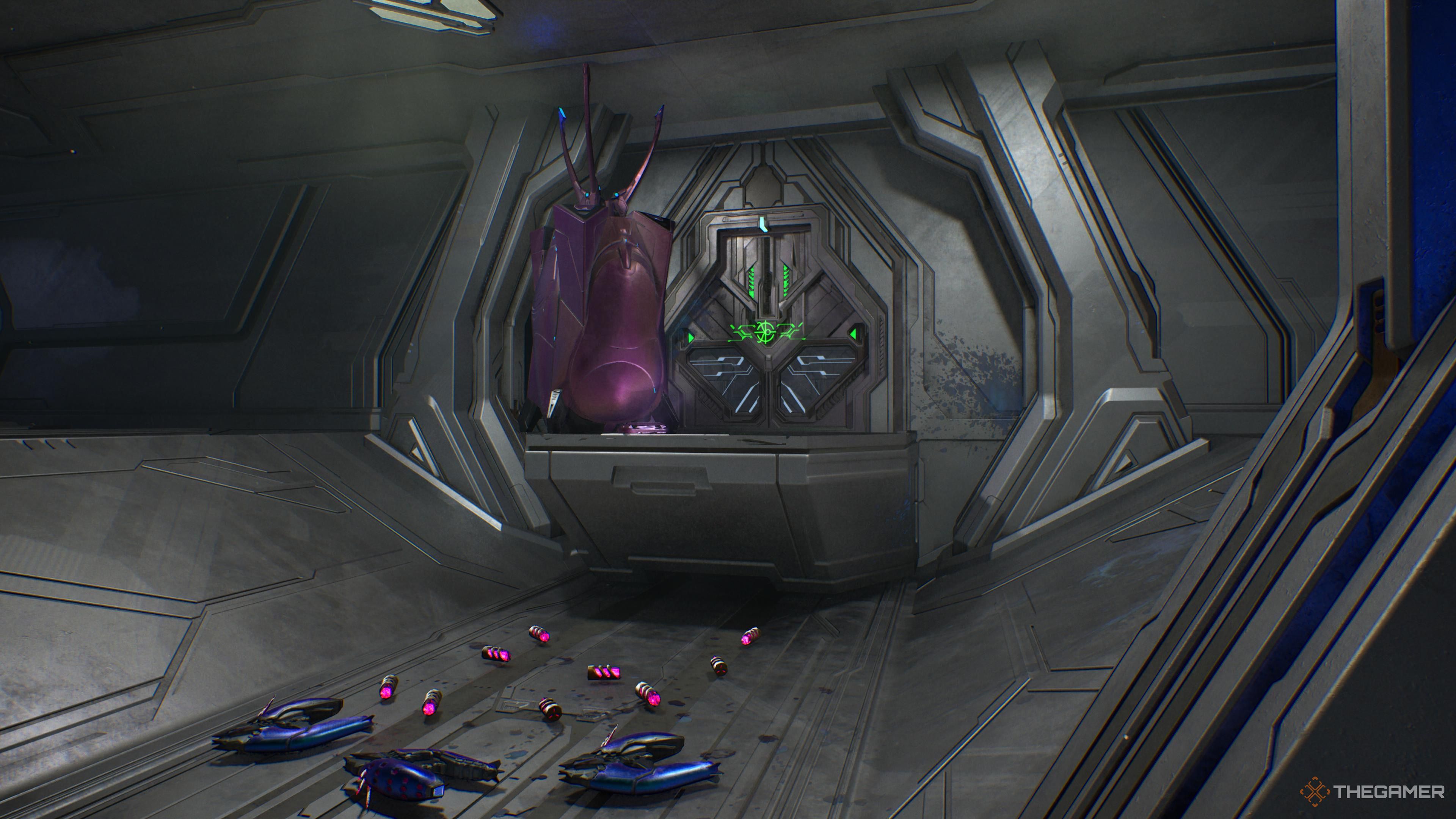 A closed door in a a metal structure in Halo: Campaign Evolved.