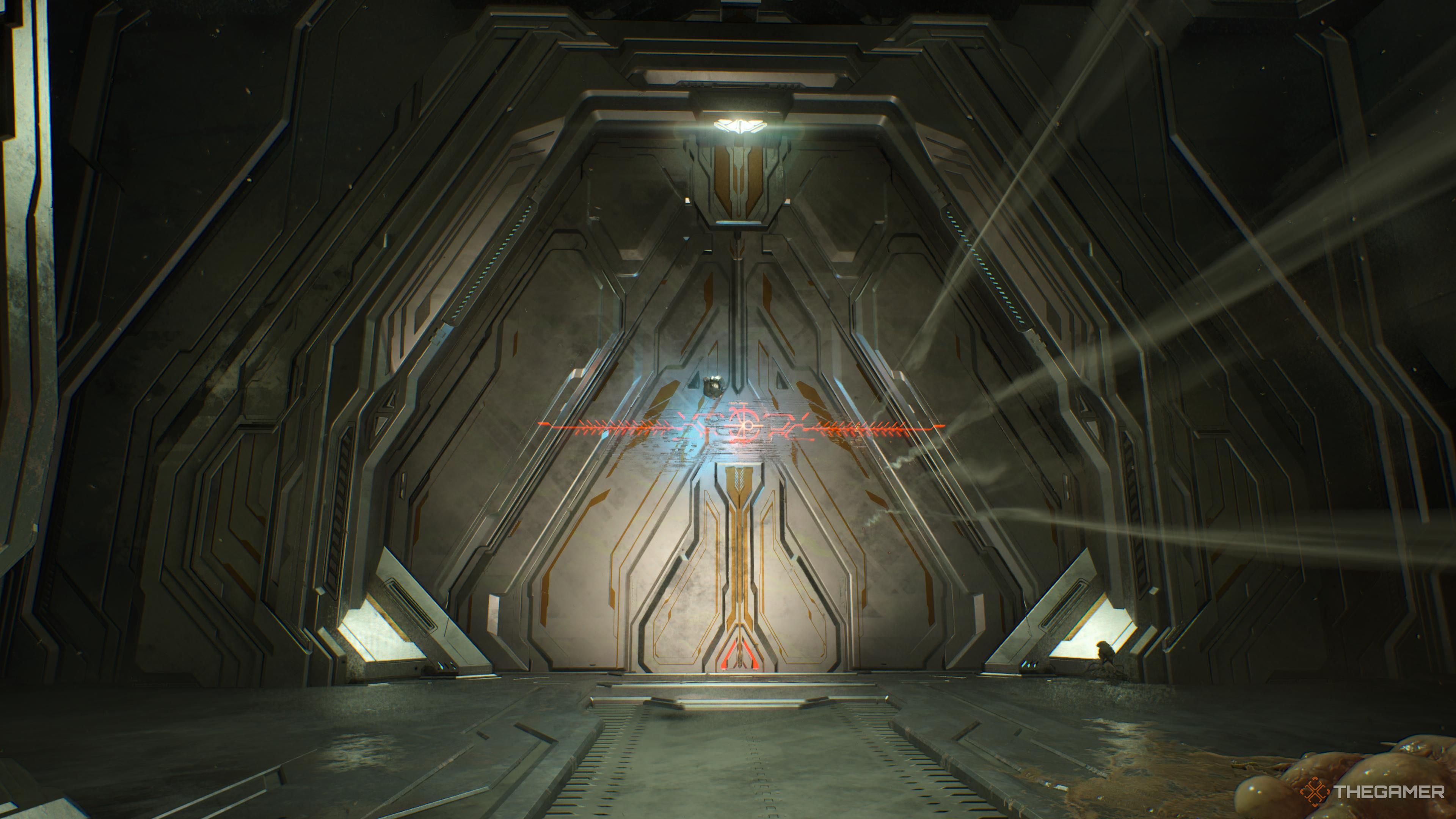 343 Guilty Spark floating in front of a locked door in Halo Campaign Evolved.