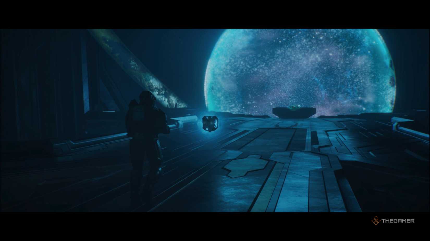 Master Chief and 343 Guilty Spark on a platform near a planetary hologram in Halo: Campaign Evolved.