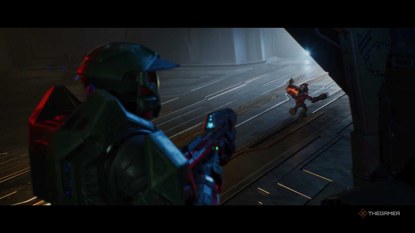 Master Chief pointing a gun at a Grunt as it runs away in Halo Campaign Evolved.