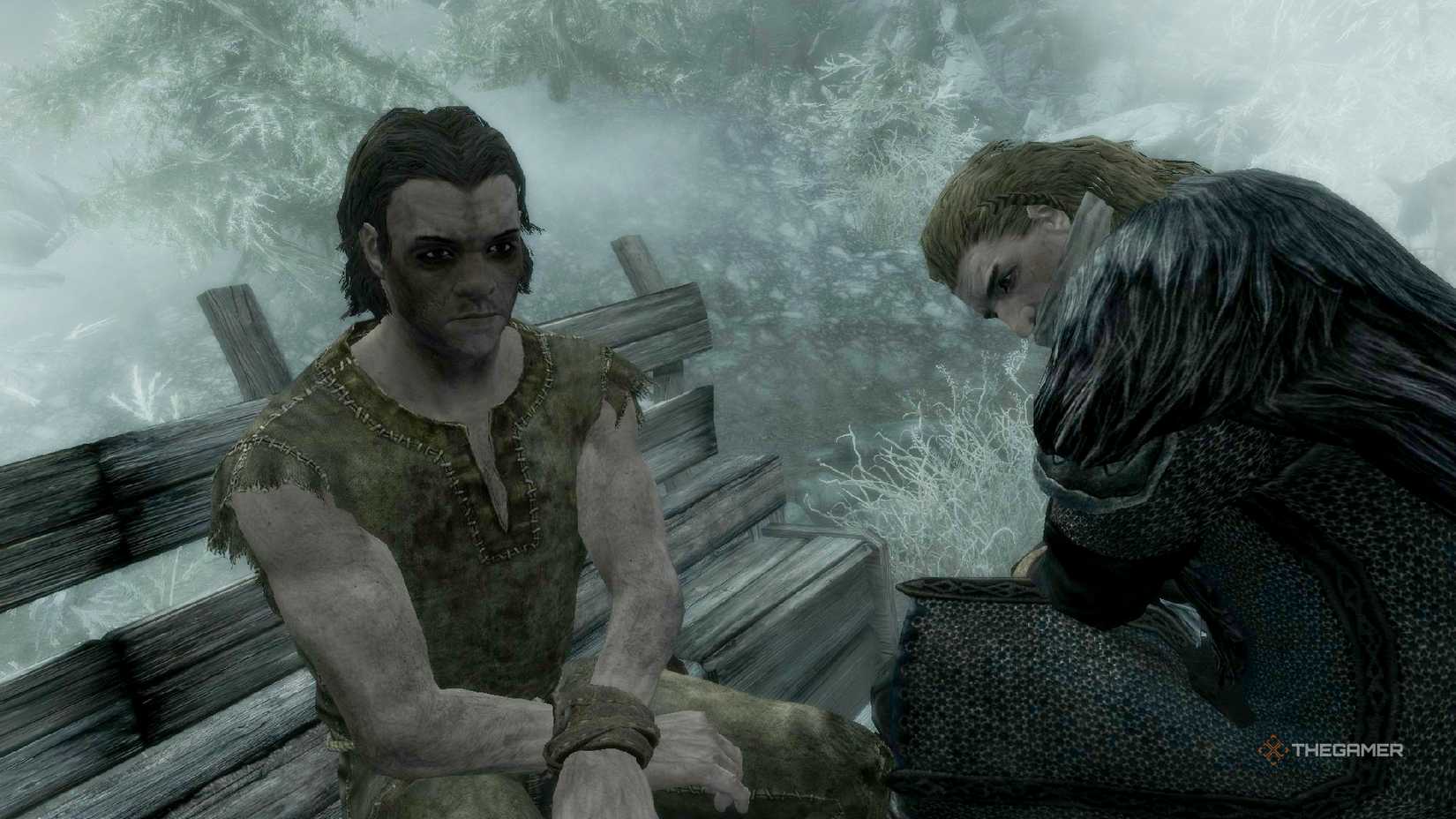 Skyrim opening showing two prisoners sat down in a cart.