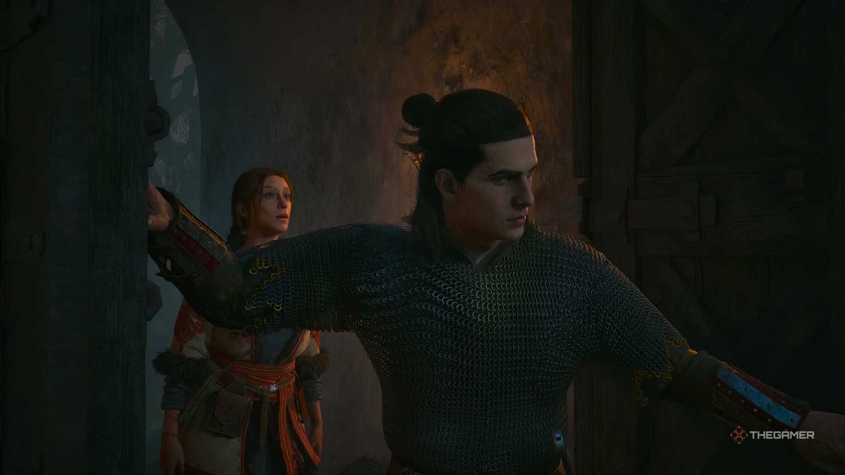 Coen and Anca passing through a door in The Blood of Dawnwalker.