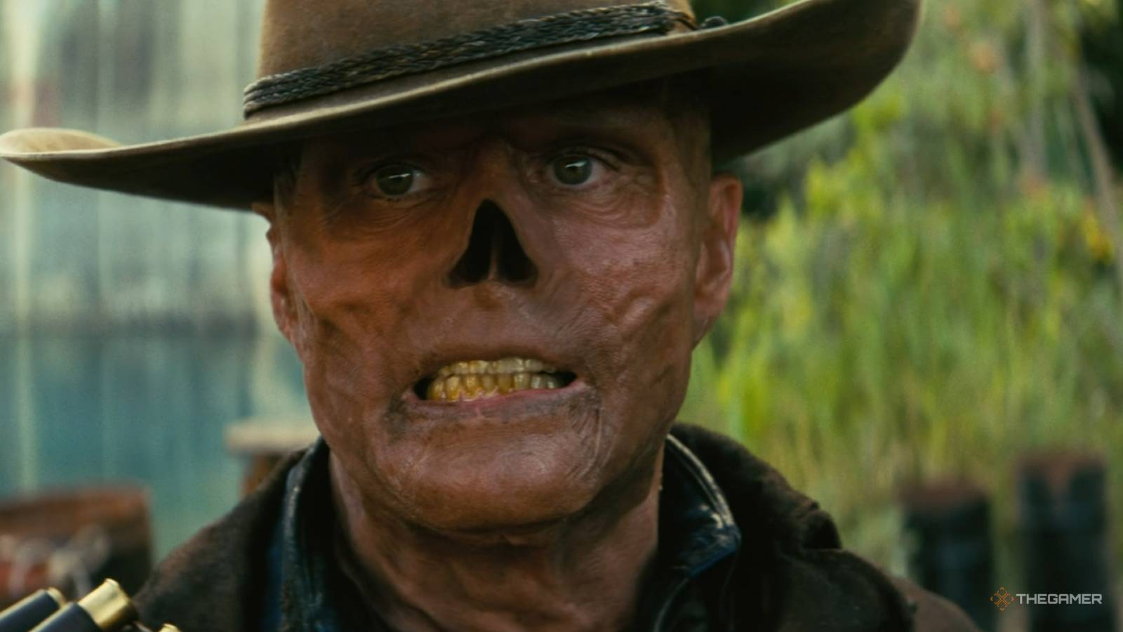 The Ghoul in Fallout Season 3. He has damaged skin, looks gaunt, is missing a nose, and has yellow teeth.