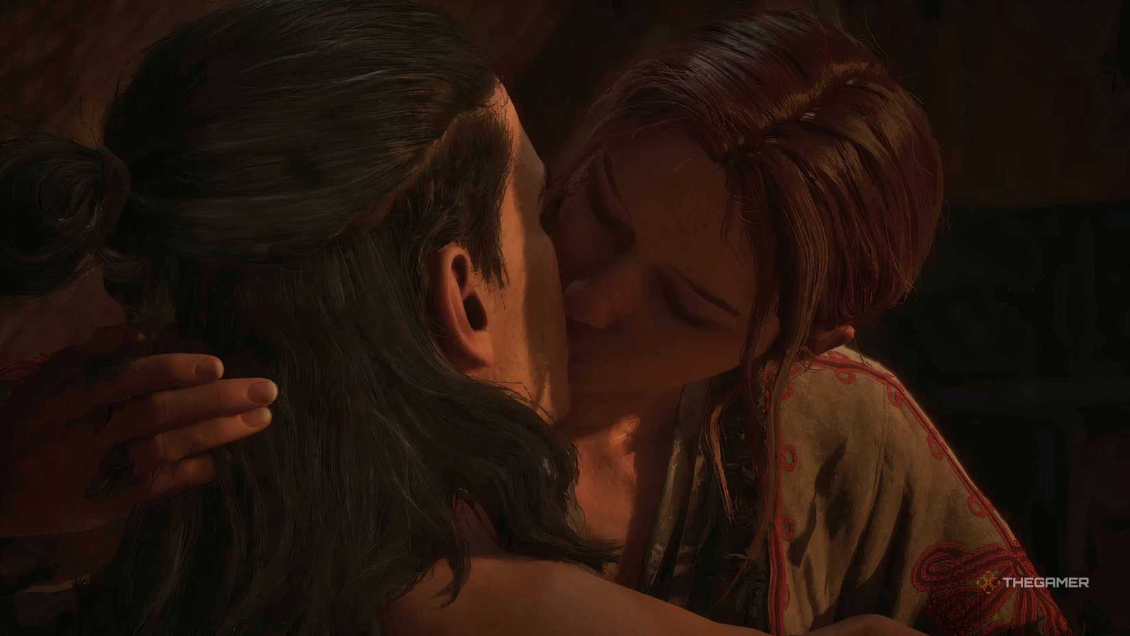 Coen and Anca kissing in The Blood of Dawnwalker.