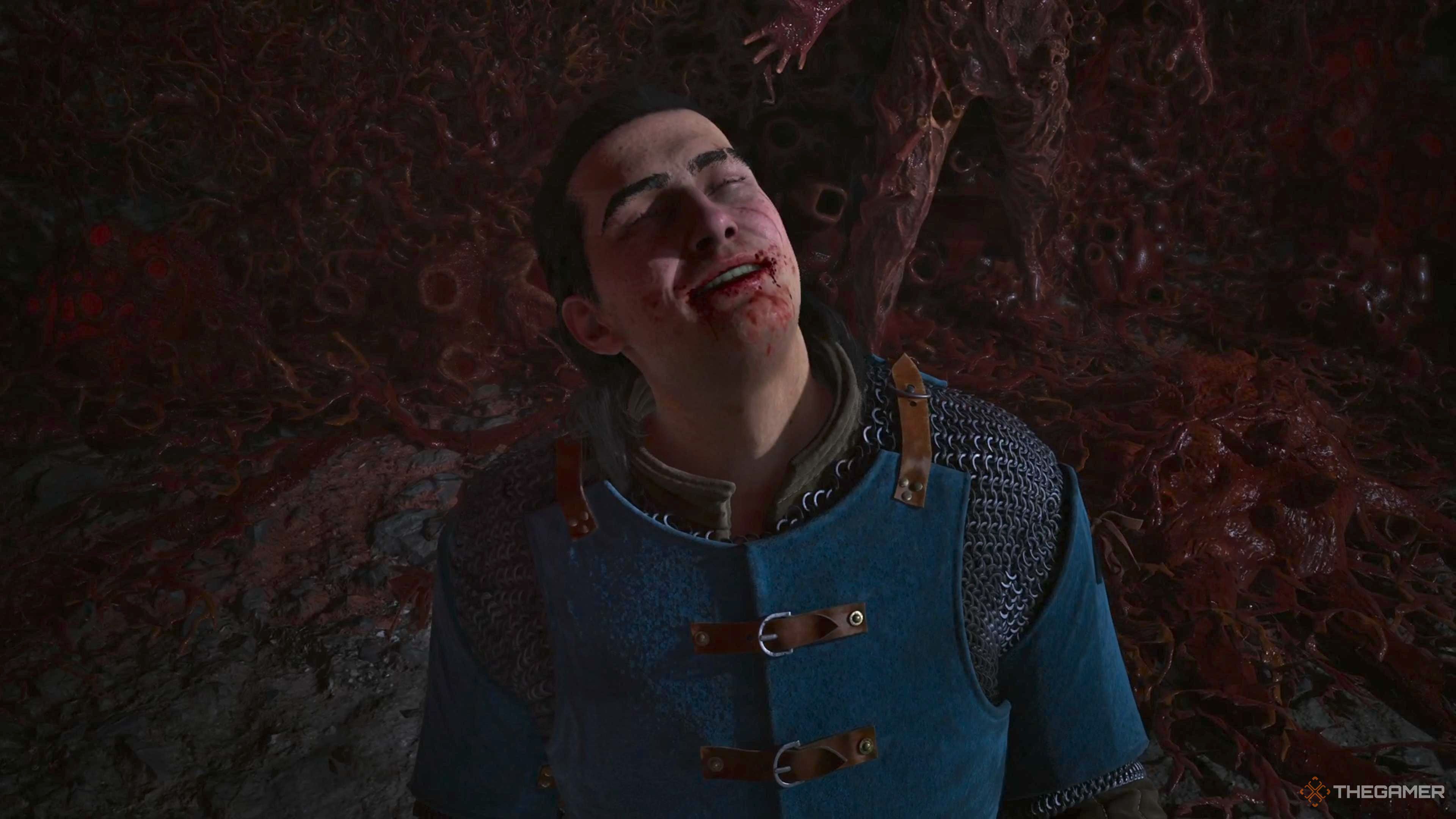 Coen smiling up at the ceiling of the cave in The Blood of Dawnwalker.