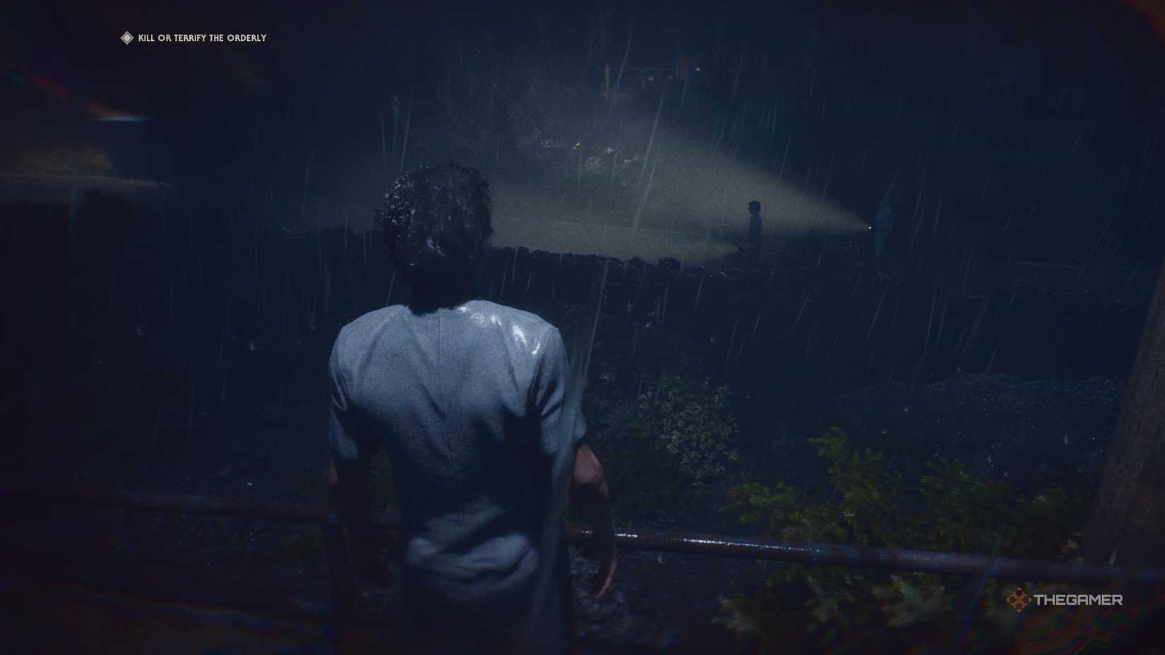 Michael watching orderlies walk on a path below him in Halloween: The Game