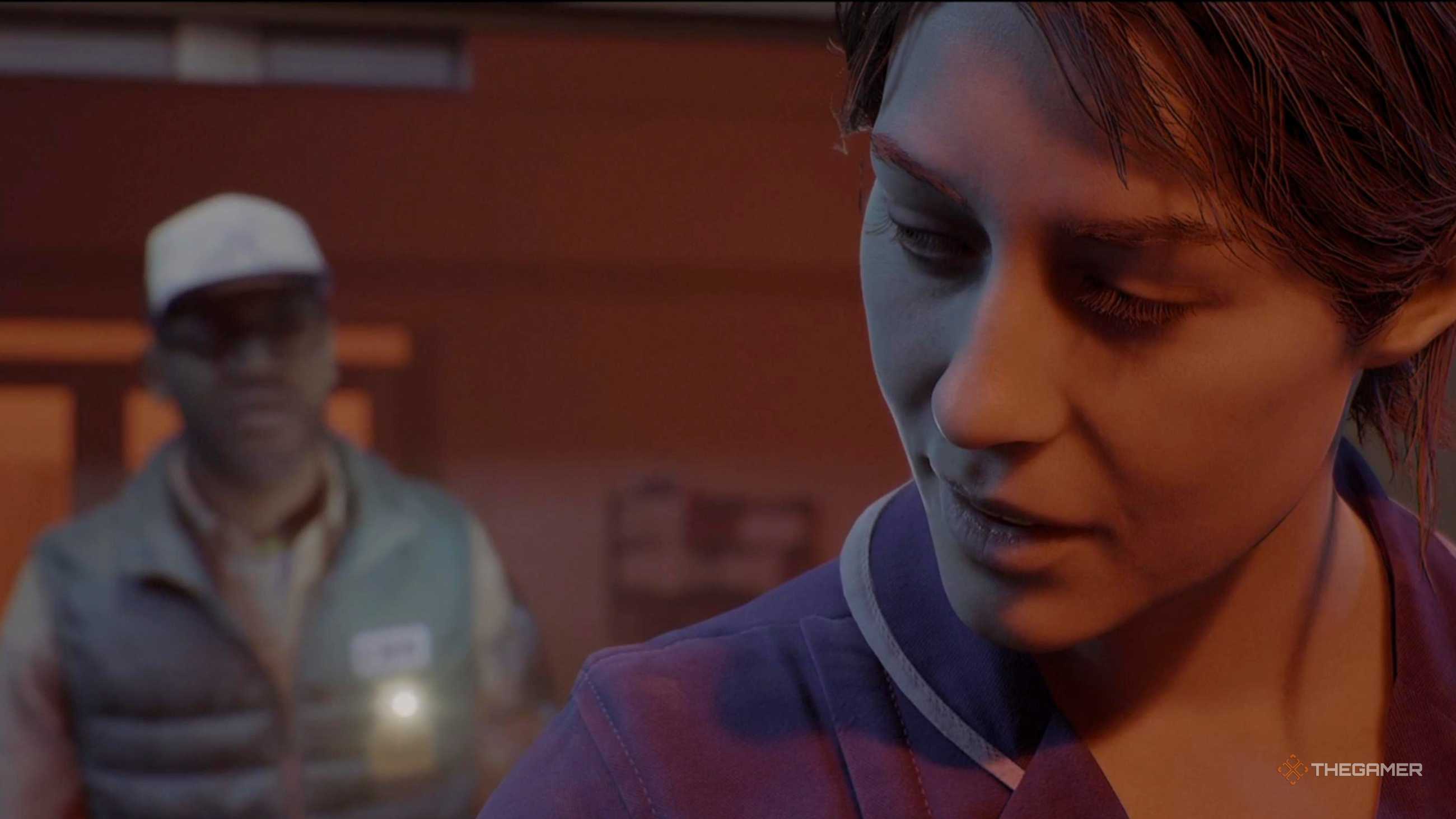 Zoe looking over her shoulder at Simon in Silent Hill Townfall.
