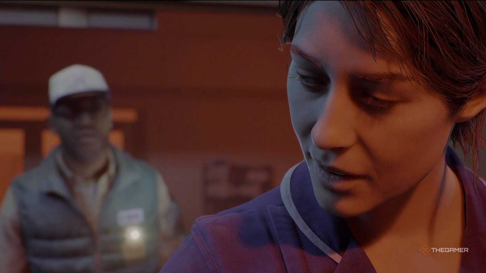 Zoe looking over her shoulder at Simon in Silent Hill Townfall.